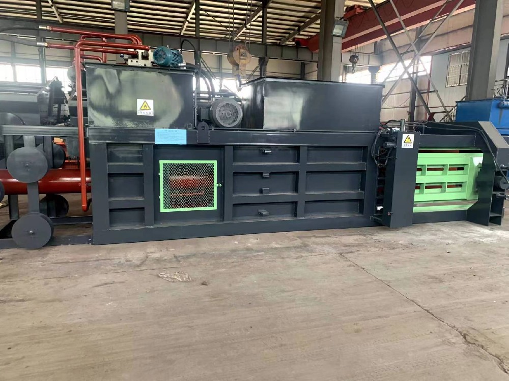 Waste paper baler