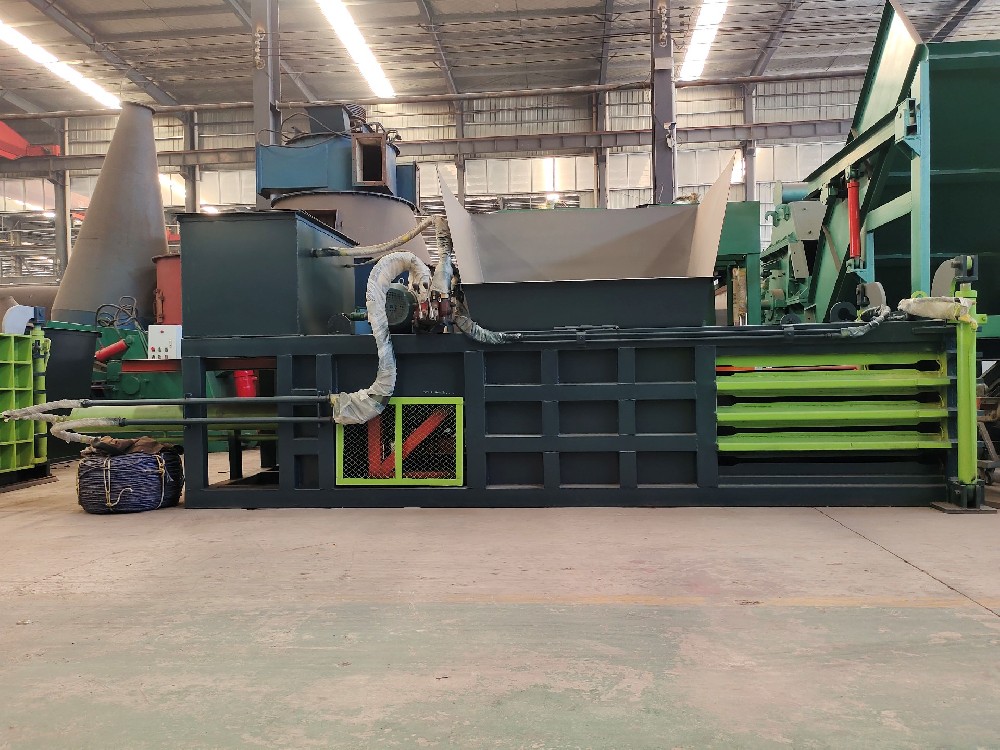 Automatic waste paper baler